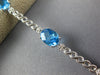 8.14CT DIAMOND & AAA BLUE TOPAZ 14KT WHITE GOLD 3D OVAL & ROUND TENNIS BRACELET