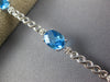 8.14CT DIAMOND & AAA BLUE TOPAZ 14KT WHITE GOLD 3D OVAL & ROUND TENNIS BRACELET