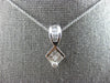 .56CT DIAMOND 14K WHITE GOLD ROUND BAGUETTE & PRINCESS INVISIBLE SQUARE PENDANT