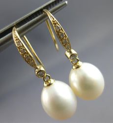 0.10CT DIAMOND & AAA SOUTH SEA PEARL 14KT YELLOW GOLD OPEN LEVERBACK FUN EARRINGS
