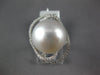 LARGE .49CT DIAMOND & AAA SOUTH SEA PEARL 18KT WHITE GOLD FLOWER LOVE KNOT RING