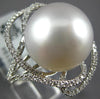 LARGE .49CT DIAMOND & AAA SOUTH SEA PEARL 18KT WHITE GOLD FLOWER LOVE KNOT RING