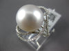 LARGE .49CT DIAMOND & AAA SOUTH SEA PEARL 18KT WHITE GOLD FLOWER LOVE KNOT RING