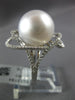 LARGE .49CT DIAMOND & AAA SOUTH SEA PEARL 18KT WHITE GOLD FLOWER LOVE KNOT RING
