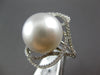 LARGE .49CT DIAMOND & AAA SOUTH SEA PEARL 18KT WHITE GOLD FLOWER LOVE KNOT RING