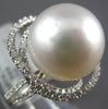 LARGE .60CT DIAMOND & AAA SOUTH SEA PEARL 18KT WHITE GOLD DOUBLE LOVE KNOT RING