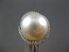 LARGE .60CT DIAMOND & AAA SOUTH SEA PEARL 18KT WHITE GOLD DOUBLE LOVE KNOT RING
