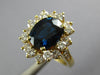 4.55CT DIAMOND AAA SAPPHIRE 18KT YELLOW GOLD OVAL & ROUND FLOWER ENGAGEMENT RING