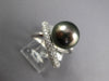 LARGE .76CT DIAMOND AAA TAHITIAN PEARL 18KT WHITE GOLD CRISS CROSS INFINITY RING