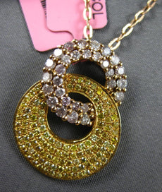1.25CT FANCY YELLOW & PINK DIAMOND 18KT YELLOW GOLD 3D DOUBLE CIRCULAR PENDANT