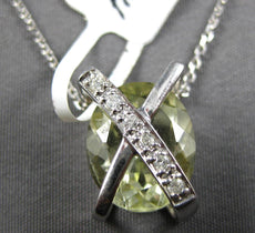 5.88CT DIAMOND & AAA GREEN AMETHYST 14KT WHITE GOLD OVAL X LOVE FLOATING PENDANT