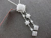 1.53CT DIAMOND 18K WHITE GOLD ROUND & PRINCESS FLOWER BY THE YARD LARIAT PENDANT