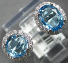 ESTATE 1.70CT DIAMOND & AAA BLUE TOPAZ 14KT WHITE GOLD OVAL & ROUND TENSION RING