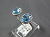 ESTATE 1.70CT DIAMOND & AAA BLUE TOPAZ 14KT WHITE GOLD OVAL & ROUND TENSION RING