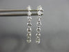.95CT DIAMOND 18K WHITE GOLD 3D OVAL INSIDE OUT SHARE PRONG HOOP HUGGIE EARRINGS