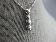 ESTATE .06CT DIAMOND 14KT WHITE GOLD 3 STONE JOURNEY HEART LOVE PENDANT #26769