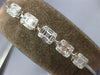 ESTATE LONG 1.01CT DIAMOND 18KT WHITE GOLD 3D ROUND & BAGUETTE CLUSTER BRACELET