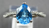 2.07CT DIAMOND & AAA BLUE TOPAZ 18KT WHITE GOLD PEAR SHAPE & ROUND INFINITY RING