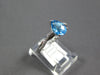 2.07CT DIAMOND & AAA BLUE TOPAZ 18KT WHITE GOLD PEAR SHAPE & ROUND INFINITY RING