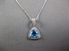 1.05CT DIAMOND & AAA BLUE TOPAZ 14K WHITE GOLD TRILLION & ROUND FLOATING PENDANT