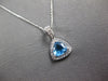 1.05CT DIAMOND & AAA BLUE TOPAZ 14K WHITE GOLD TRILLION & ROUND FLOATING PENDANT