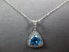 1.05CT DIAMOND & AAA BLUE TOPAZ 14K WHITE GOLD TRILLION & ROUND FLOATING PENDANT