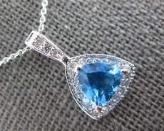 1.05CT DIAMOND & AAA BLUE TOPAZ 14K WHITE GOLD TRILLION & ROUND FLOATING PENDANT