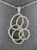ESTATE LARGE 1.47CT DIAMOND 18KT TRI COLOR GOLD CIRCULAR OVAL LOVE KNOT PENDANT