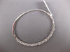 1.35CT DIAMOND & AAA RUBY 18KT WHITE GOLD INFINITY SEMI ETENRITY BANGLE BRACELET