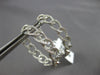 LARGE 1.23CT DIAMOND 14KT WHITE GOLD INSIDE OUT LOVE KNOT HOOP HANGING EARRINGS