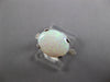 2.43CT DIAMOND & AAA OPAL 18KT WHITE GOLD OVAL & ROUND CLASSIC ENGAGEMENT RING