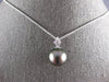.06CT DIAMOND & AAA TAHITIAN PEARL 14KT WHITE GOLD FLORAL STAR FLOATING PENDANT