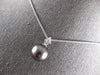 .06CT DIAMOND & AAA TAHITIAN PEARL 14KT WHITE GOLD FLORAL STAR FLOATING PENDANT