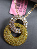 1.25CT FANCY YELLOW & PINK DIAMOND 18KT YELLOW GOLD 3D DOUBLE CIRCULAR PENDANT