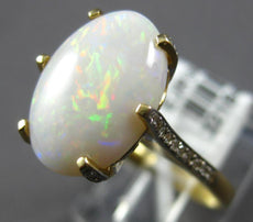 4.08CT DIAMOND & AAA OPAL 14KT 2 TONE GOLD CLASSIC OVAL & ROUND ENGAGEMENT RING