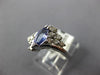 .98CT DIAMOND & AAA TANZANITE 14KT WHITE GOLD MARQUISE & ROUND CRISS CROSS RING