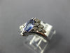 .98CT DIAMOND & AAA TANZANITE 14KT WHITE GOLD MARQUISE & ROUND CRISS CROSS RING
