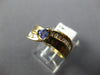 .69CT DIAMOND & AAA TANZANITE 14K YELLOW GOLD TRILLION & BAGUETTE WAVE LOVE RING
