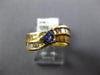 .69CT DIAMOND & AAA TANZANITE 14K YELLOW GOLD TRILLION & BAGUETTE WAVE LOVE RING