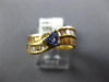 .69CT DIAMOND & AAA TANZANITE 14K YELLOW GOLD TRILLION & BAGUETTE WAVE LOVE RING