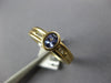 ESTATE .45CT DIAMOND & AAA TANZANITE 14KT YELLOW GOLD 3D OVAL & ROUND BEZEL RING