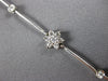 ESTATE .75CT DIAMOND 14KT WHITE GOLD FLOWER BY THE YARD CLASSIC TENNIS BRACELET