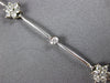 ESTATE .75CT DIAMOND 14KT WHITE GOLD FLOWER BY THE YARD CLASSIC TENNIS BRACELET