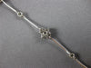 ESTATE .75CT DIAMOND 14KT WHITE GOLD FLOWER BY THE YARD CLASSIC TENNIS BRACELET