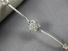 ESTATE .75CT DIAMOND 14KT WHITE GOLD FLOWER BY THE YARD CLASSIC TENNIS BRACELET