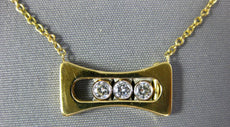 ESTATE .17CT DIAMOND 18KT 2 TONE GOLD 3D 3 STONE ETOILE FLOATING LOVE PENDANT