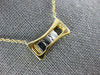ESTATE .17CT DIAMOND 18KT 2 TONE GOLD 3D 3 STONE ETOILE FLOATING LOVE PENDANT