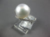 0.42CT DIAMOND & AAA SOUTH SEA PEARL 14KT WHITE GOLD CRISS CROSS LOVE KNOT RING