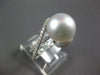 0.42CT DIAMOND & AAA SOUTH SEA PEARL 14KT WHITE GOLD CRISS CROSS LOVE KNOT RING