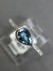 .65CT DIAMOND & AAA BLUE TOPAZ 14KT WHITE GOLD PEAR SHAPE & ROUND BEZEL FUN RING
